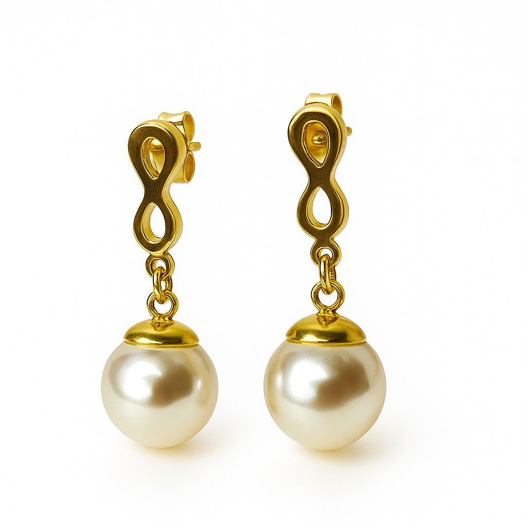 Pair of pearl earrings with gold hooks on a white background