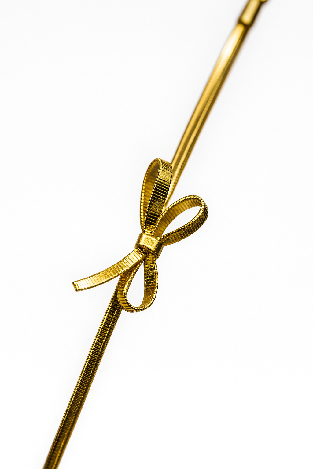 Gold ribbon with a bow on a white background