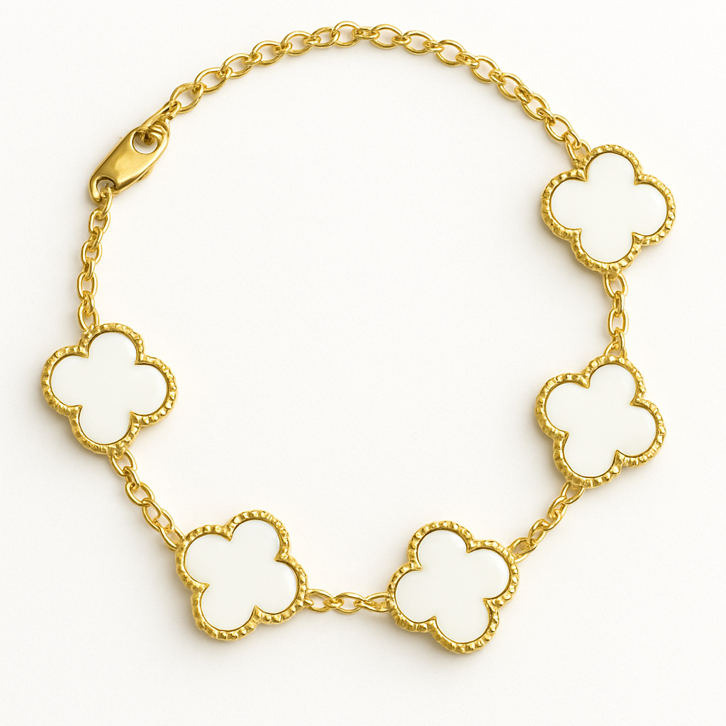 Gold bracelet with clover-shaped links on a white background