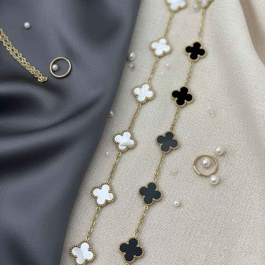 Necklace with floral designs on a fabric background