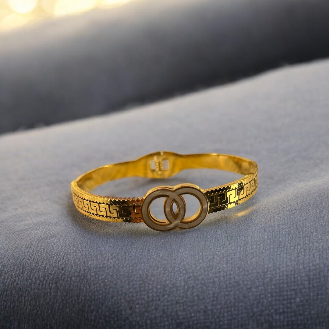 Designer Cuff Bracelet with Entwined Hoops