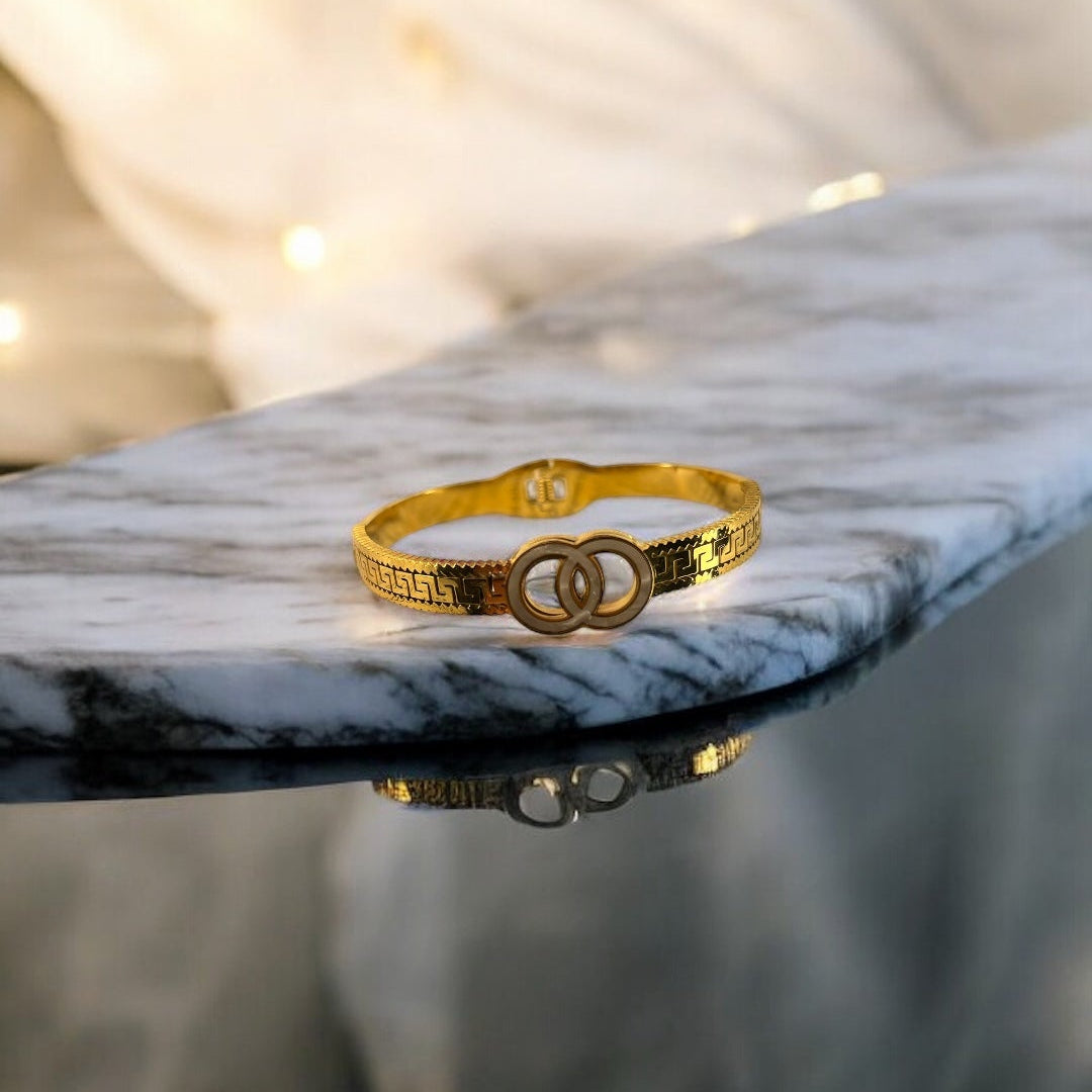 Designer Cuff Bracelet with Entwined Hoops